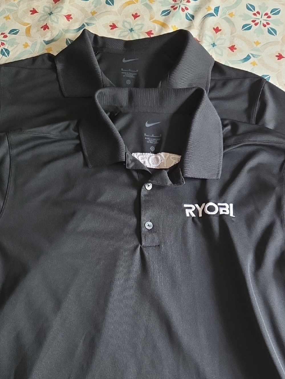 Nike Black Polos with White RYOBI Logo